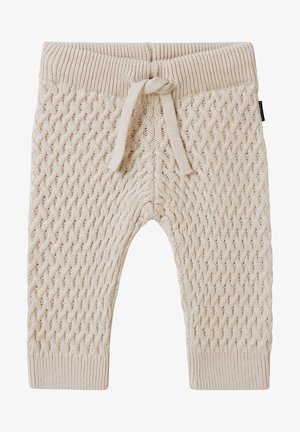Pantalon bébé tricoté beige avec motif torsadé texturé, poignets côtelés et cordon de serrage à la taille.