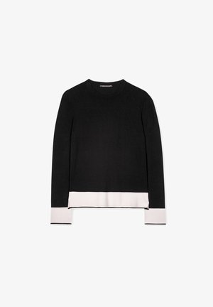 Black long-sleeve sweater with a contrasting pink hem and cuffs. Smooth texture, round neck, and side slits for added detail.