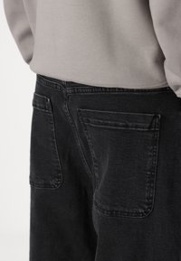 Hollister Co. Vrečaste kavbojke - washed black