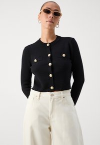 GAP Petite BAGGY - Traperice opuštenog kroja - ecru