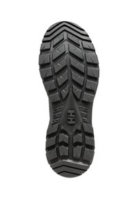 Suela de zapato de goma negra con surcos profundos y una superficie texturizada. Presenta un logo central y patrones pronunciados para agarre y tracción.