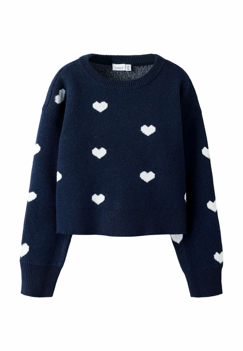 Pull cropped marine en tissu tricoté, avec des motifs de cœurs blancs sur l'ensemble, doté d'un col rond côtelé et de poignets côtelés.
