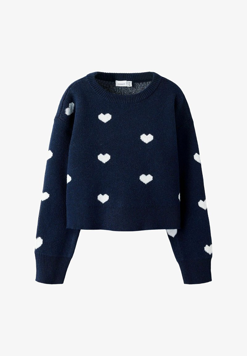 Granatowy krótkie sweter wykonany z dzianiny, z białymi wzorami serc rozproszonymi na całej powierzchni, z prążkowanym okrągłym dekoltem i mankietami.