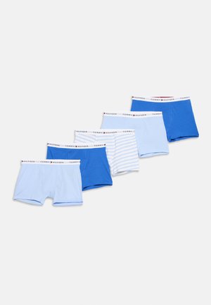 Five pairs of Tommy Hilfiger men's boxer briefs in shades of blue, including solid and striped designs, arranged in a diagonal line.