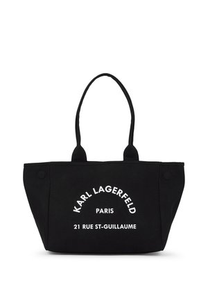 Sac cabas noir avec deux poignées, texte blanc indiquant "KARL LAGERFELD PARIS 21 RUE ST-GUILLAUME" au centre devant.