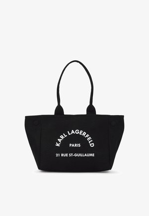 Sort mulepose med to håndtag, hvid tekst med teksten "KARL LAGERFELD PARIS 21 RUE ST-GUILLAUME" på fronten i midten.
