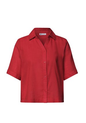 Chemise rouge à manches courtes avec boutons et col, en tissu léger, présentée sur fond blanc.