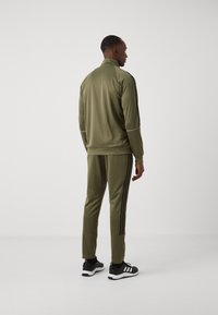 adidas Sportswear TRACKSUIT - Melegítő - olive strata