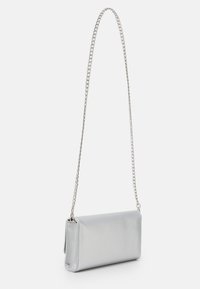 Silver rectangular handbag with textured surface and long silver chain strap against white background.