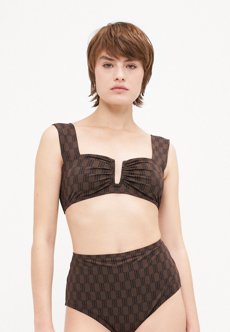 Brown two-piece bikini featuring a patterned top with ruching and a keyhole detail, paired with high-waisted bottoms in the same design.