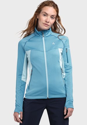 Light blue fitted jacket with a high collar, textured fabric, contrasting light blue panels, and zippered pockets. Lightweight and breathable design.