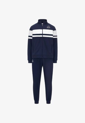 Tuta da uomo navy con giacca zippata e strisce bianche sulle spalle, abbinato a pantaloni. Realizzato in tessuto morbido ed elastico.