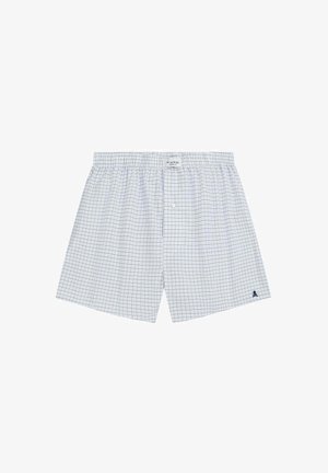 Boxer bianchi con un motivo a griglia blu, realizzati in cotone. Presentano un elastico in vita e un singolo bottone davanti. Logo sull'orlo.