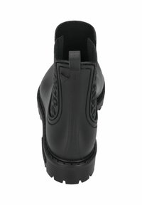 Bottine noire avec un extérieur en cuir lisse, des panneaux latéraux élastiques et une semelle robuste. Une boucle au talon facilite le port.