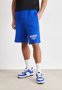 HUGO - NOMARIO - Pantaloni de trening - open blue Imagine miniatură 1