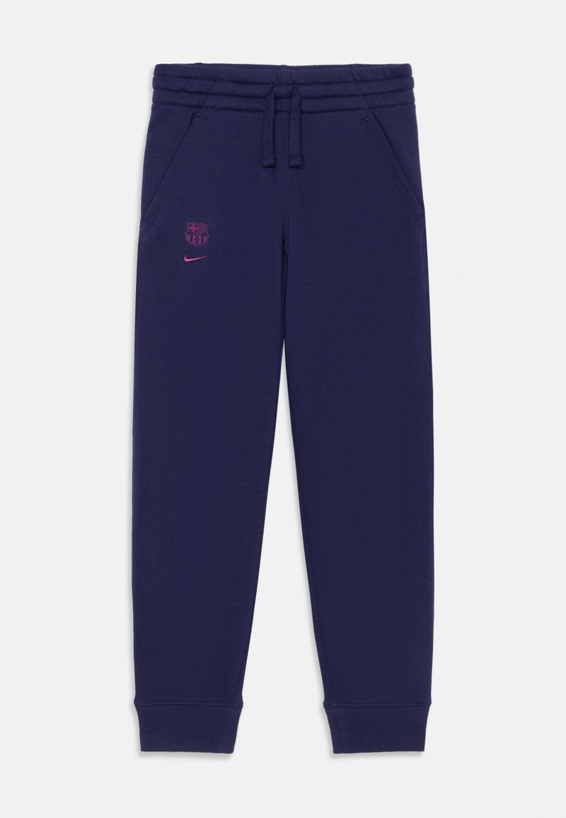 Jūras zila sporta bikses, kas izgatavotas no mīkstas auduma, ar elastīgu jostu, sānu kabatām un rozā Nike logotipu kopā ar Barselonas simbolu.