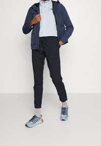 Jack Wolfskin Träningsbyxor - blue