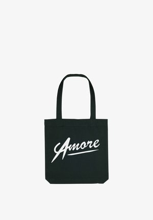 Zwarte canvas schoudertas met twee handvatten, met het woord "Amore" in witte cursieve tekst op de voorkant. Eenvoudig ontwerp, rechthoekige vorm.