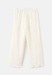 Bílé, lehké kalhoty z mačkané tkaniny s elastickým pasem. Mají rovný střih nohavic a volánkový lem u kotníků.