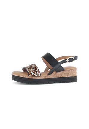 Zwarte leren wedge sandalen met geweven multicolor band. Korken platform en rubberen zool bieden grip. Verstelbare enkelband voor een goede pasvorm.