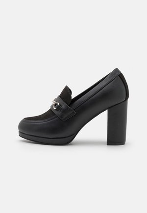 Højhælede pumps - black