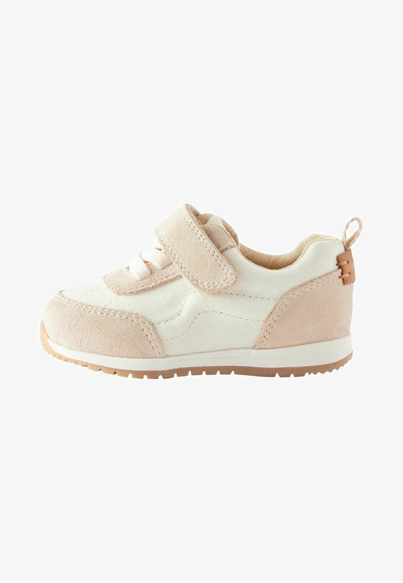 Light pink and cream sneaker featuring a textured fabric upper, suede accents, white laces, and a hook-and-loop strap for closure.