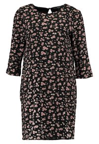 Mustapuku, jossa on kolmanneksen mittaiset hihat, joissa on vaaleanpunaisia ja valkoisia kukkakuoseja, sekä pieni avaus yksityiskohtana kaula-aukossa.