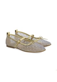 Transparente Ballettschuhe mit gepunktetem Muster, beigen Riemen und einer Schleifendetail vorne. Flache Sohle mit glatter Oberfläche.