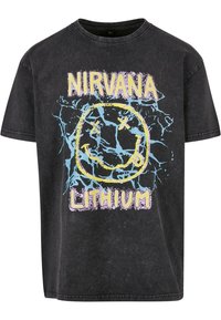 Black cotton t-shirt with a round neck, featuring a distressed graphic print of a smiley face and text "NIRVANA LITHIUM" in vibrant colors.