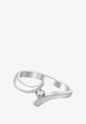 Bague en argent avec un anneau lisse incurvé, des accents texturés et un petit cristal rond positionné de manière asymétrique.