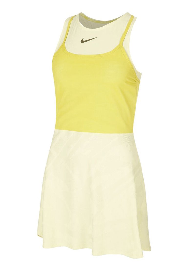 Vestido deportivo amarillo con un diseño sin mangas, que presenta un cuerpo de un amarillo claro y una falda acampanada y texturizada. Logo de Nike en el pecho.