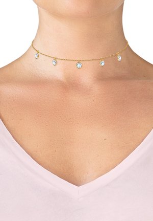 Gold-tone choker necklace featuring five round, light blue gemstones set in a pronged mount, linked by a delicate chain.