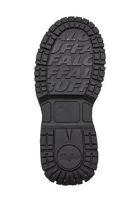 Black rubber shoe sole with deep treads and the word "Buffalo" embossed multiple times on the bottom surface.