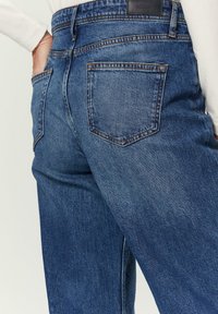 s.Oliver SURI MID  - Wide leg - blau