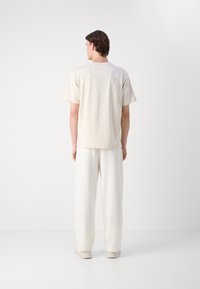 BOSS TEE - Basic T-shirt - open white