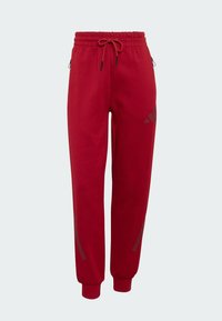 adidas Sportswear Z N E - Donji dijelovi trenirke - active maroon