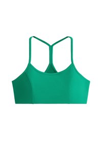 Brassière de sport verte avec fines bretelles doubles formant un dos nageur et tissu texturé sans coutures.