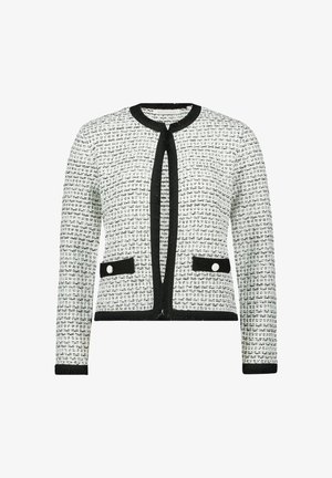 Tweed-Jacke in Schwarz und Weiß mit rundem Ausschnitt, offenem Vorderteil, zwei Fronttaschen mit Knöpfen und Fransenverzierungen entlang der Kanten.