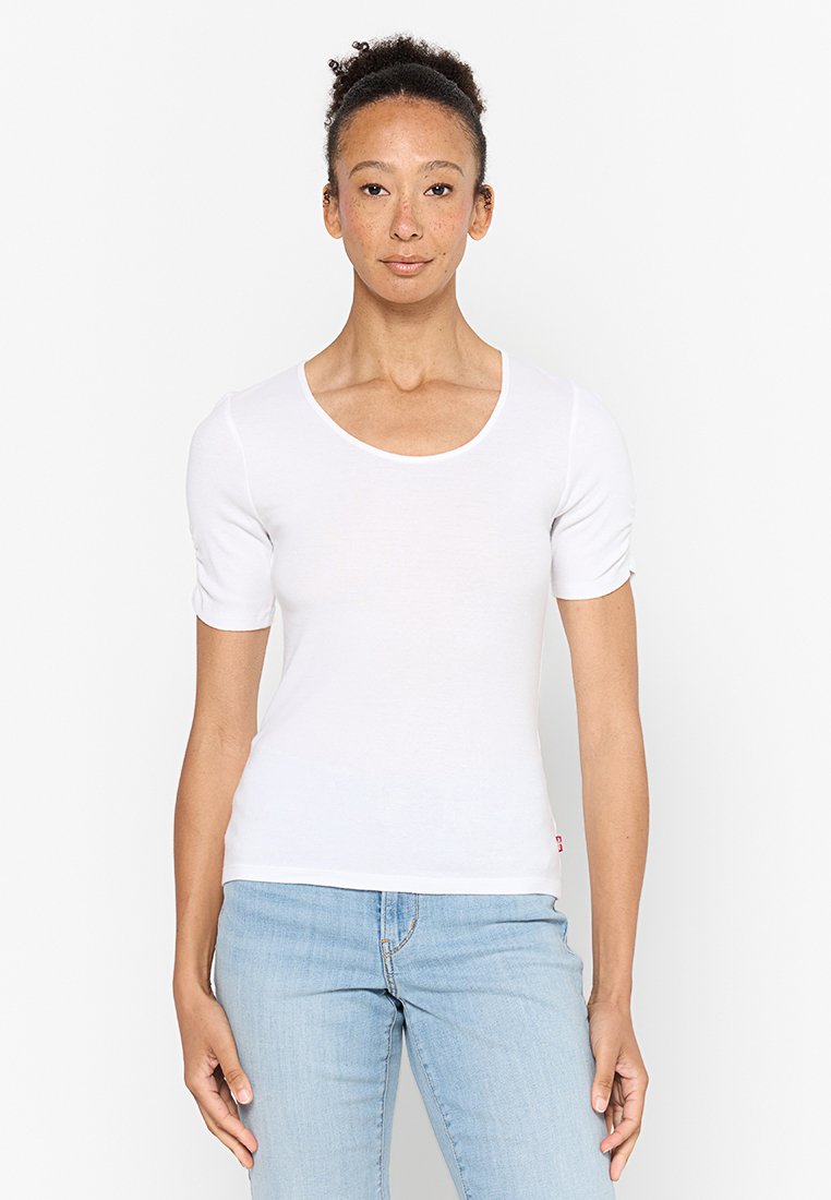 White short-sleeve t-shirt in a fitted style, made from soft cotton material with a round neckline and subtle logo detail at the hem.