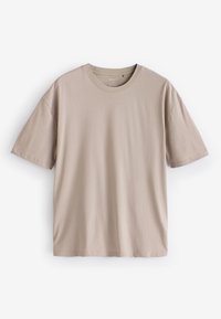 Beige kortærmet t-shirt lavet af blødt bomuld. Har en rund halsudskæring og afslappet pasform, uden fremtrædende logoer eller mønstre.
