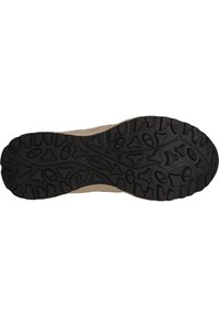 Semelle en caoutchouc avec des crampons profonds et multidirectionnels pour une meilleure adhérence. Présente une surface noire texturée et un périmètre lisse et plus clair.