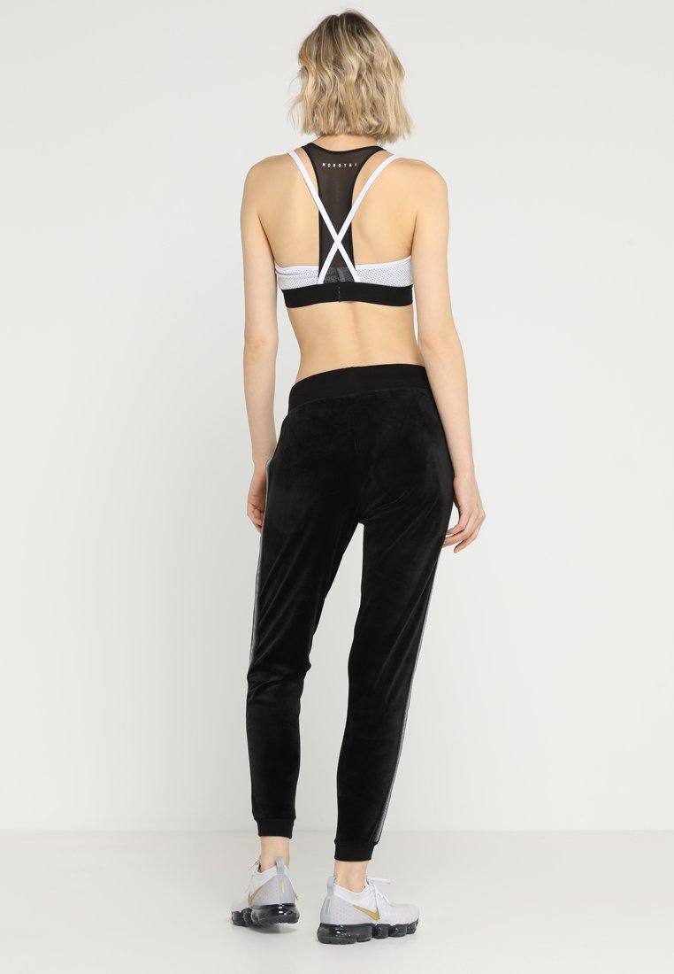 Hunkemöller SLIM PANT VELOUR Joggebukse blacksvart Hunkemöller SLIM PANT VELOUR Joggebukse blacksvart
