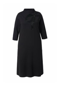 Schwarzes Kleid mit hohem Ausschnitt, dreiviertel Ärmeln und einem Pailletten-Bow-Detail auf der Vorderseite. Aus einem glatten Stoff mit lockerer Passform gefertigt.