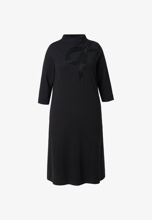 Czarna sukienka z wysokim dekoltem, rękawami o długości trzy czwarte oraz detalem w postaci cekinowej kokardy z przodu. Wykonana z gładkiego materiału, o luźnym kroju.