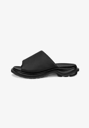 Black sandal with an open toe design, made of smooth material, featuring a contoured sole and a raised edge for added support.