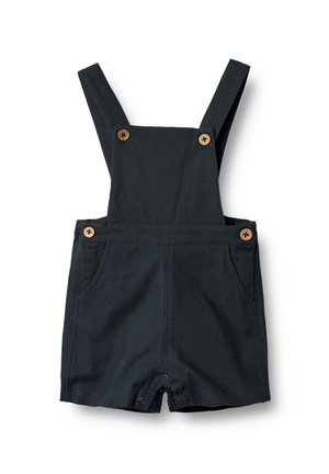 Mono de algodón azul oscuro con tirantes ajustables, detalles de botones de madera, dos bolsillos frontales y botones a presión en la parte inferior para facilitar su uso.