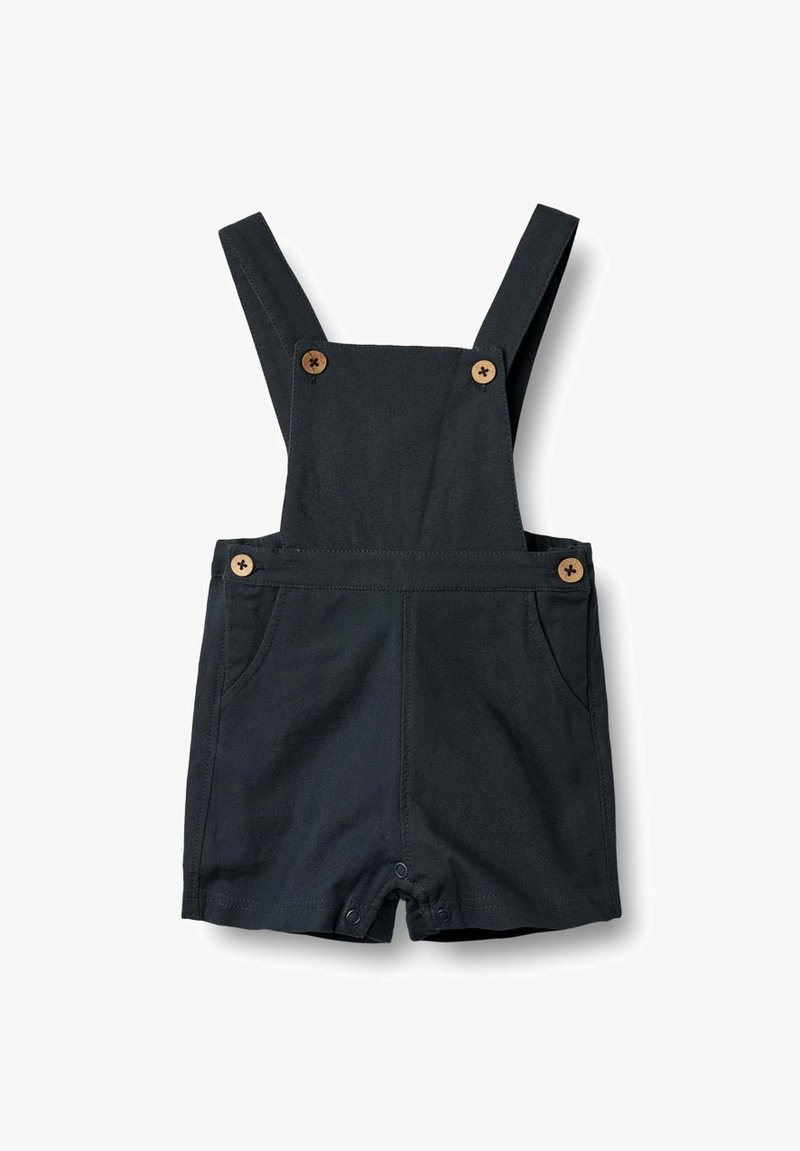 Dark blue cotton overalls with adjustable straps, wooden button accents, two front pockets, and snap-buttons at the bottom for easy wear.