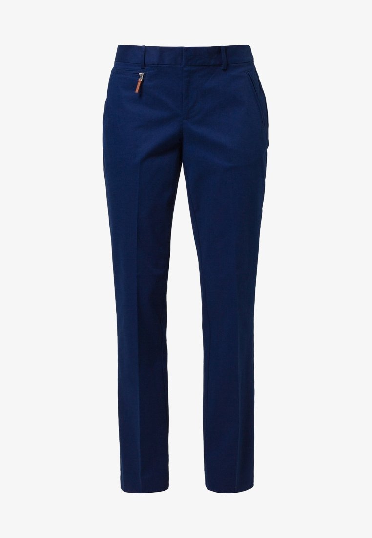 Pantalon bleu marine avec une texture lisse, coupe droite, poche zippée et tirette de zip en contraste marron. Coupe ajustée avec des plis repassés.