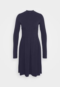 Długo rękawowa, dopasowana granatowa sukienka z okrągłym dekoltem, rozkloszowanym dołem i gładką teksturą, wykonana z miękkiego, elastycznego materiału.