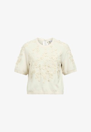 Kreemjas lühikeste varrukatega kootud pluus ümmarguse kaelusega, millel on 3D lillemotiivid esiküljel ja varrukaistel ning väike tagumine lipskinnitusega.